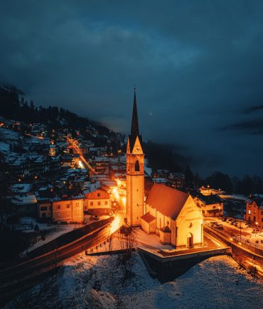 Aerial drone view of the San Lorenzo Church illuminated at night
